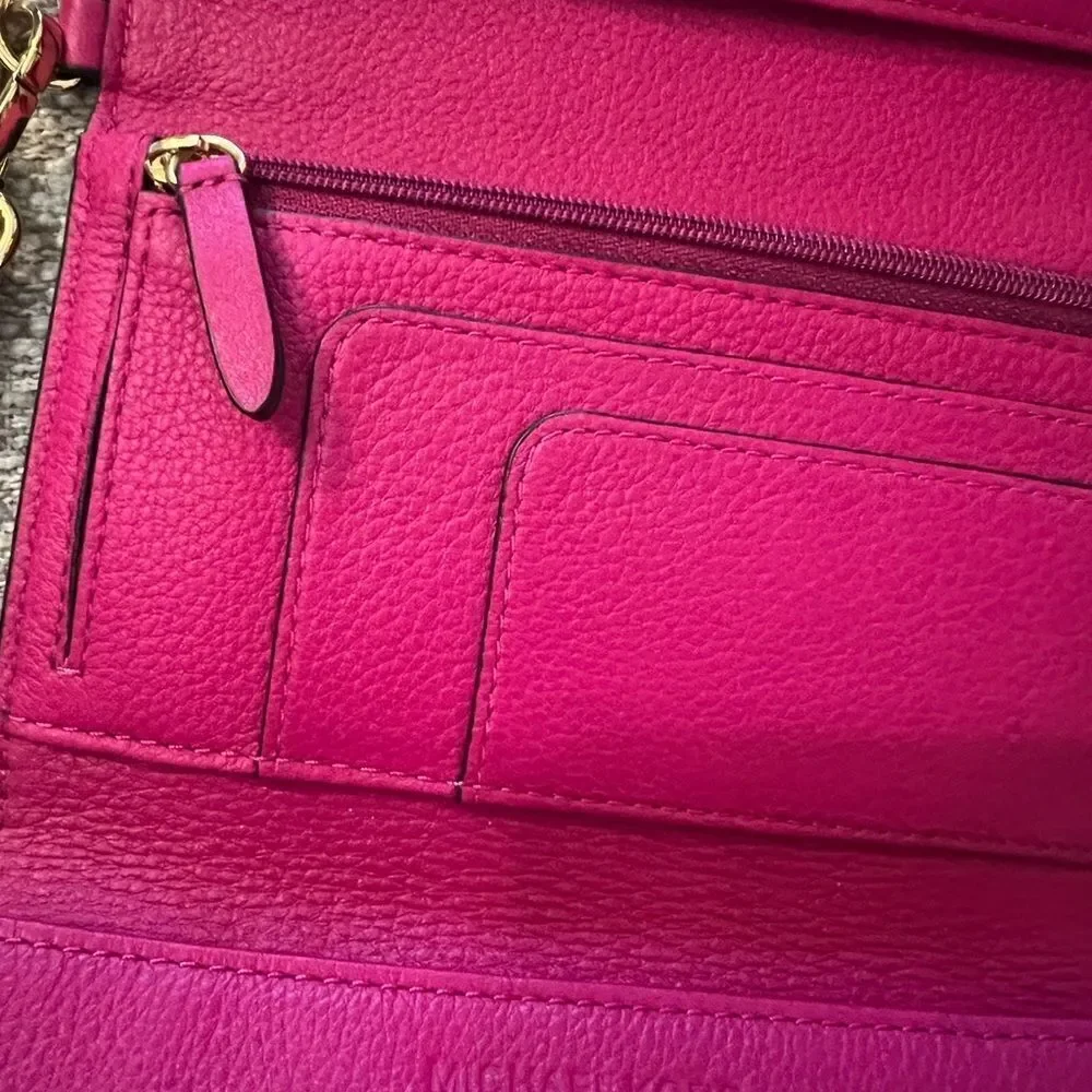Michael Kors fuchsia multi function wristlet